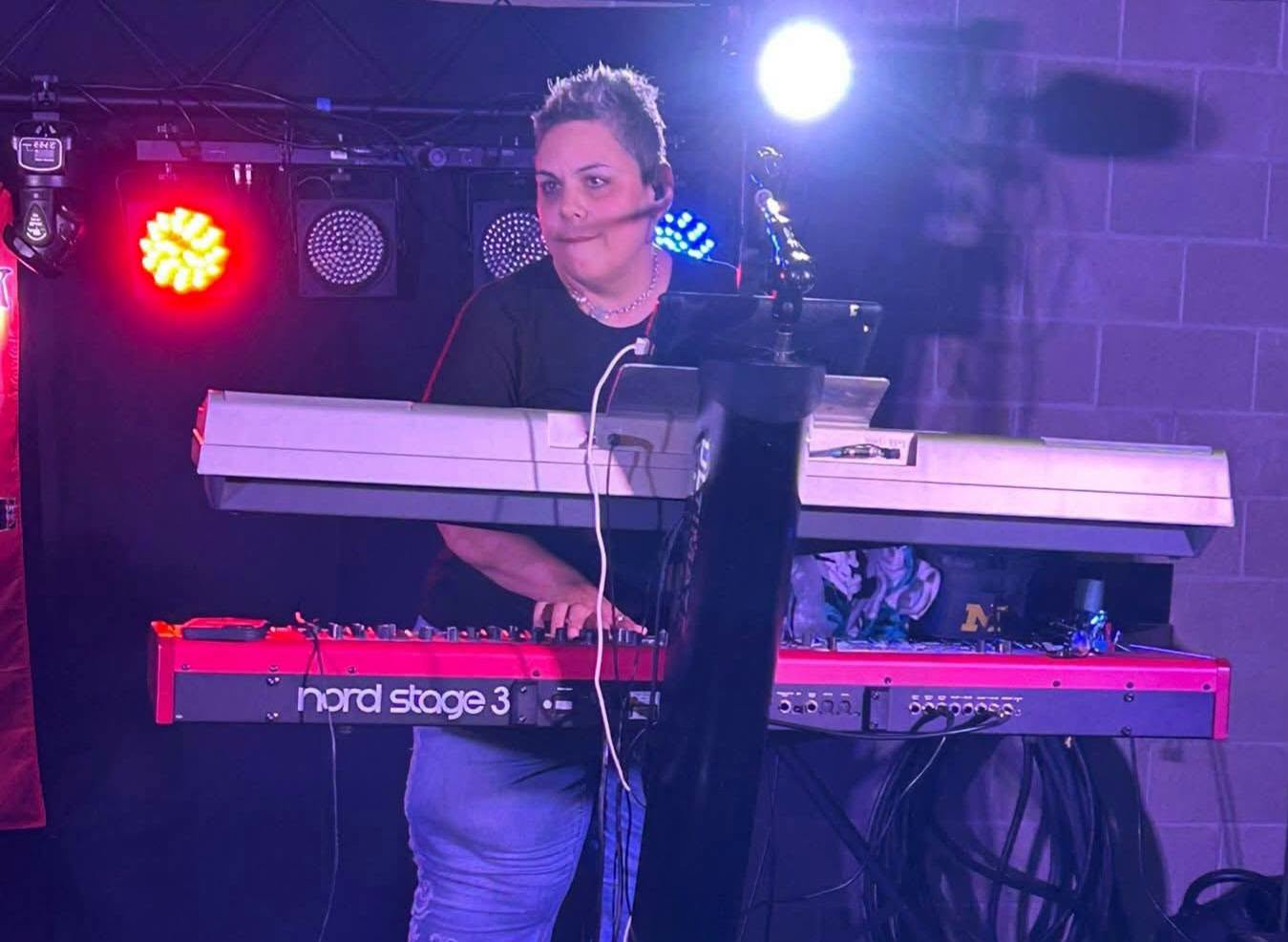 Ann Cruz playing a Nord Stage 3 keyboard